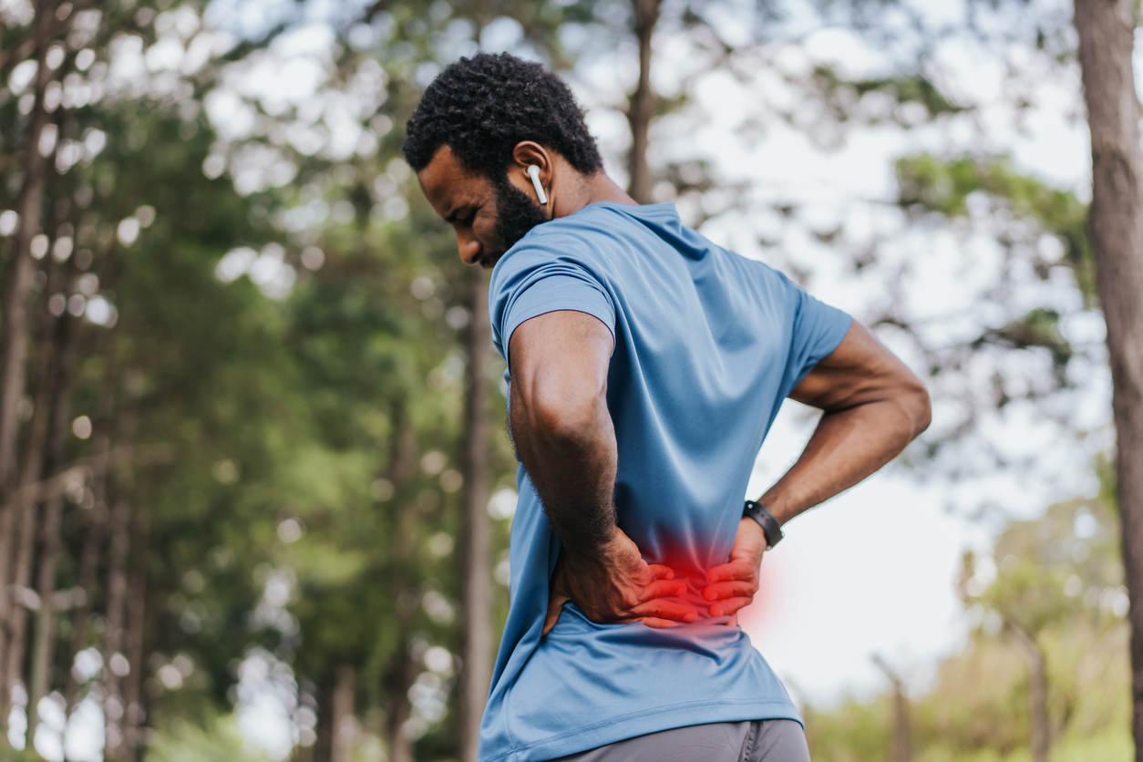 Portrait of a mature man with back pain