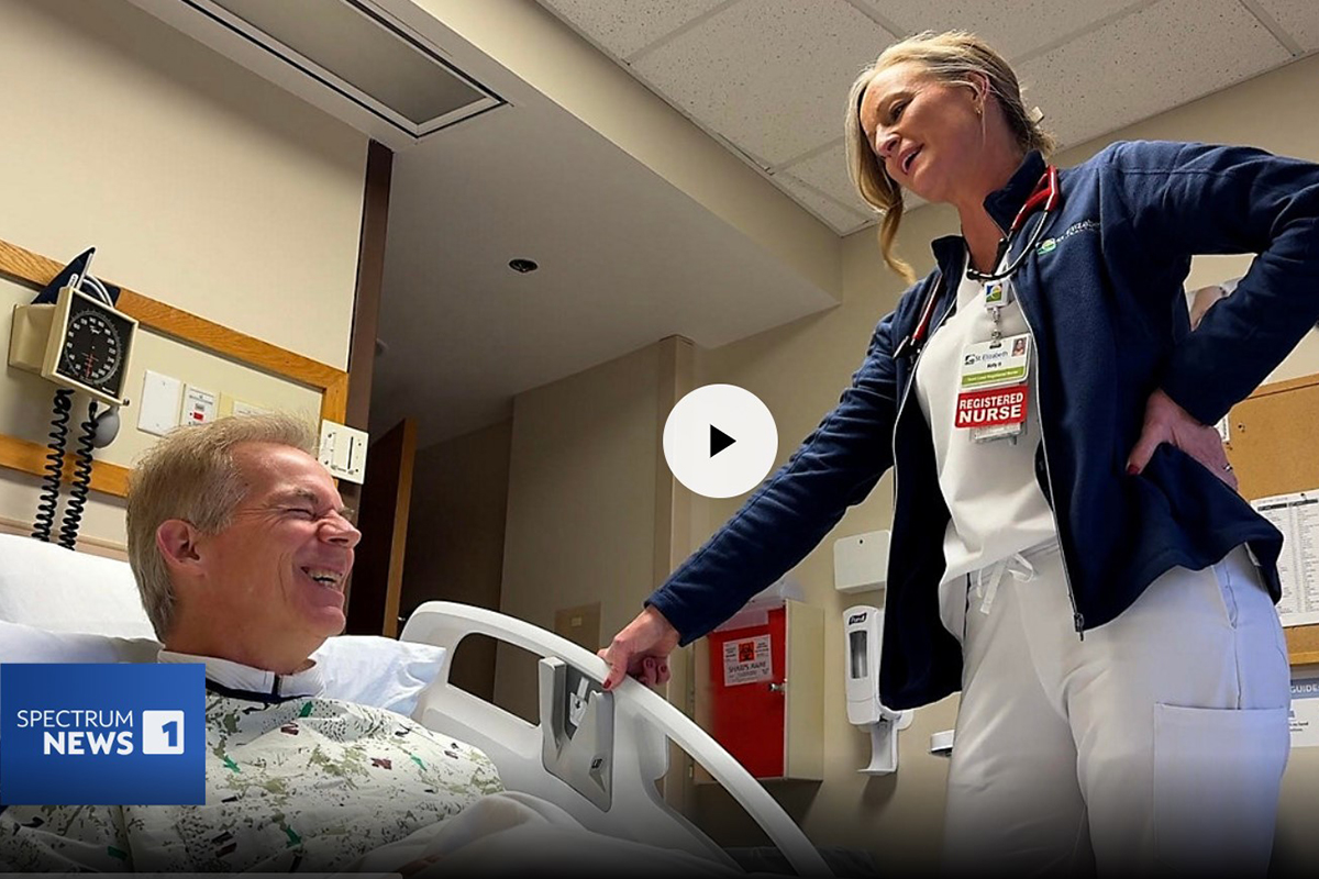 Nurse speaks with patient